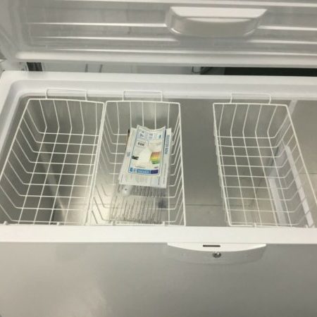 Photograph of a large, chest freezer