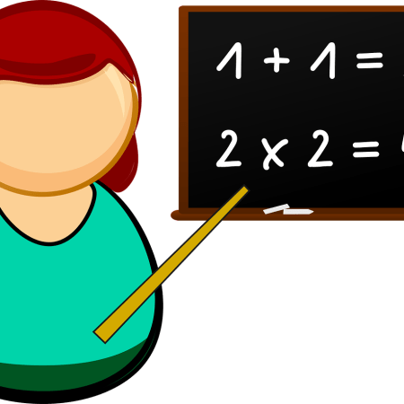 Clipart of a teacher pointing to a blackboard