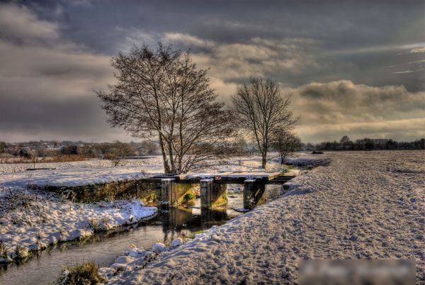 A processedphoto showing a river close to me, in the snow.